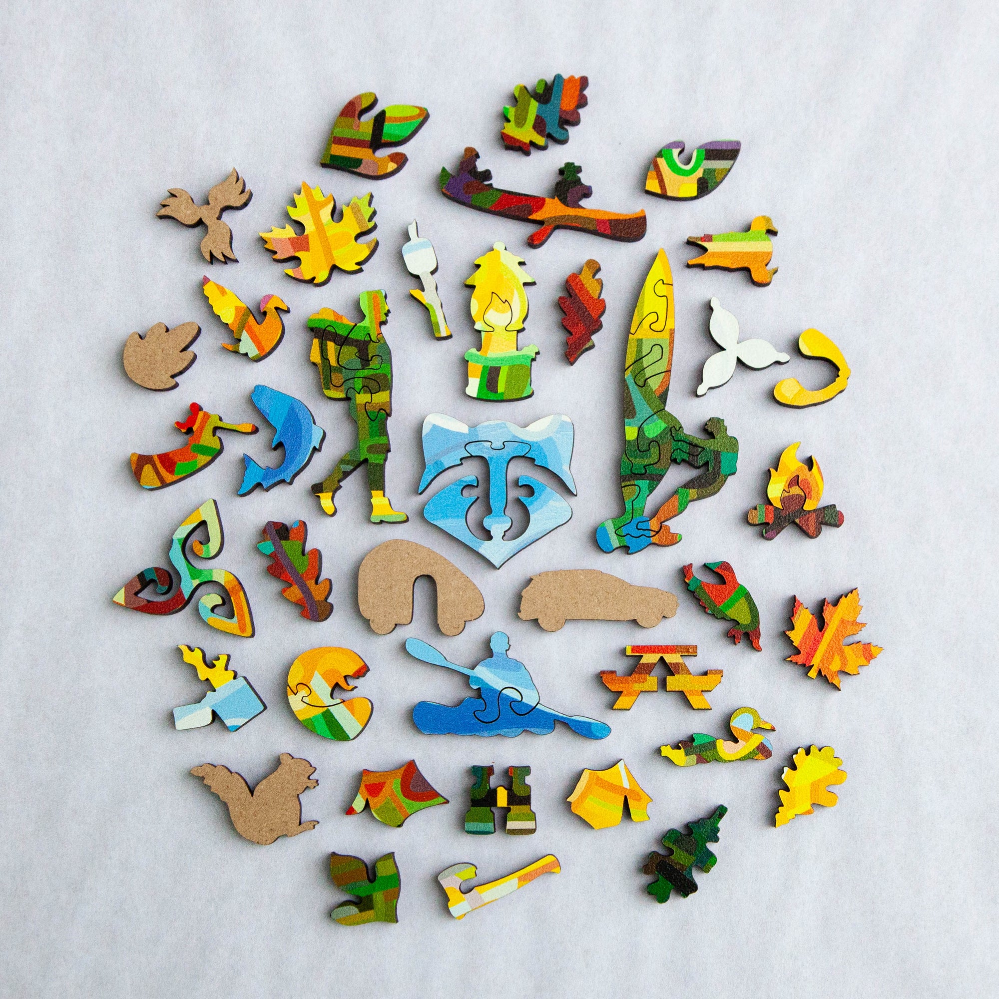 wooden puzzles pieces layed out 