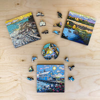 Artistic wooden jigsaw puzzle trio